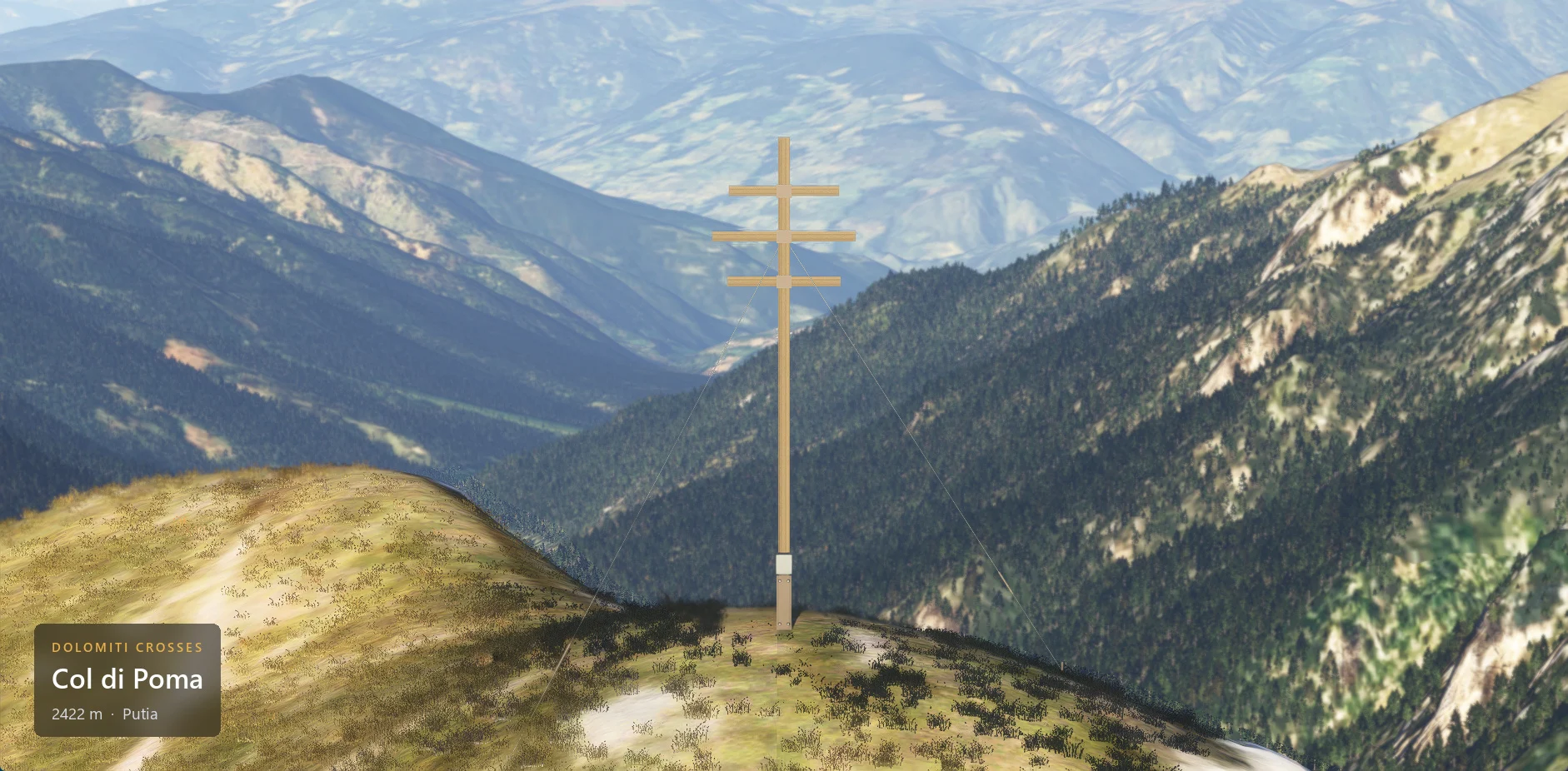 The summit cross on Col di Poma (2422 m) seen from the front, with the caption plate in the lower left corner.