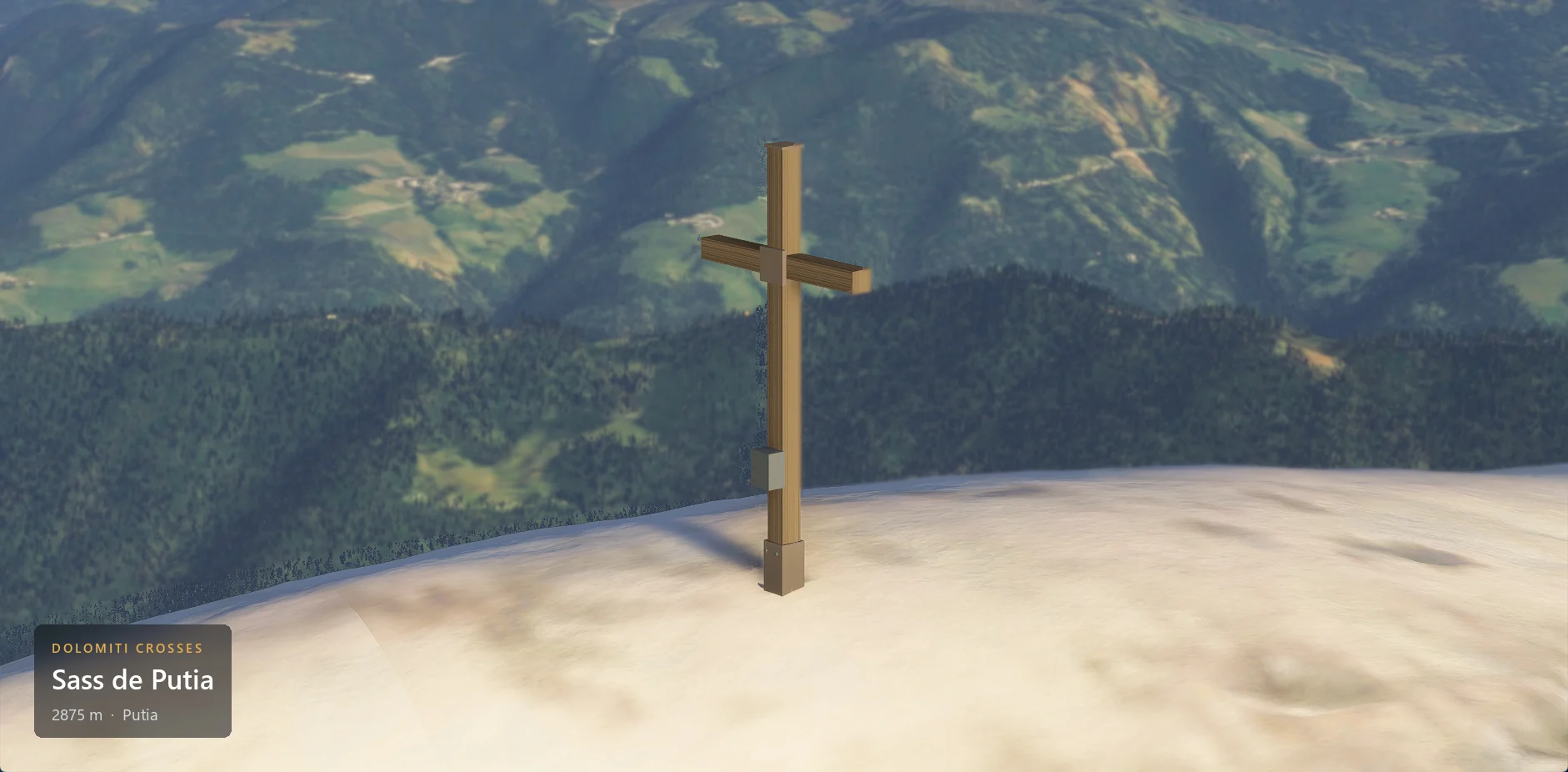 The summit cross on Sass de Putia (2875 m) seen from the side, with the caption plate in the lower left corner.